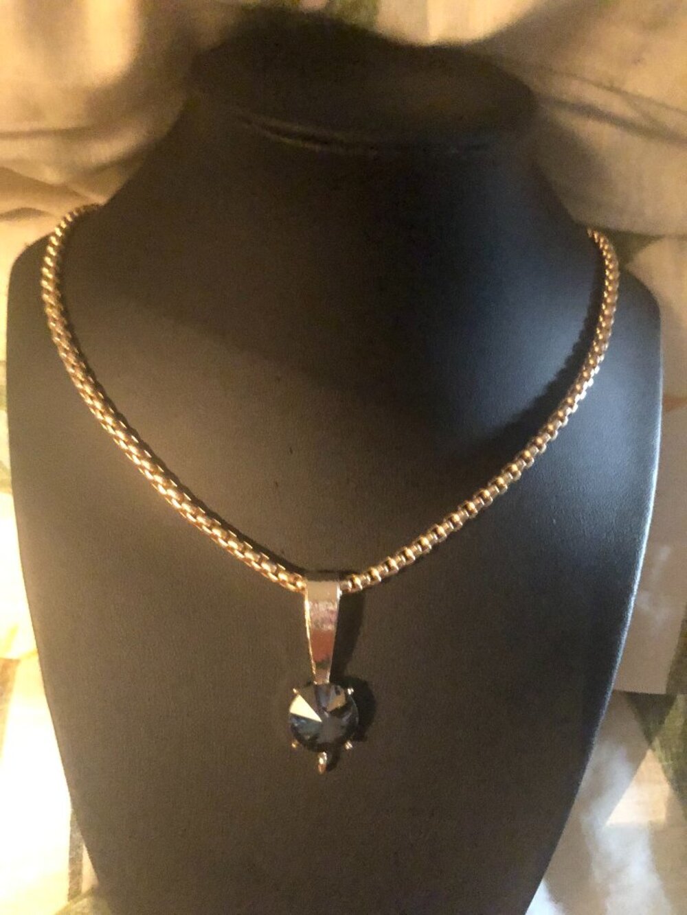 Women's gold and black gem necklace